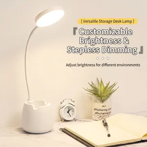 Minimalist white LED desk lamp with flexible neck and organizer base in a home setting