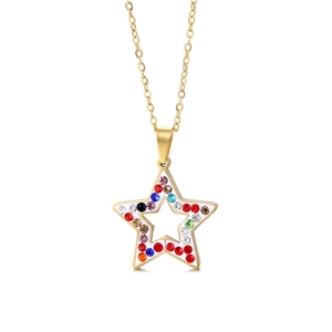 Gold star pendant necklace with colorful rhinestones and white enamel on a white background