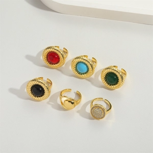 Set of 6 gold adjustable rings featuring colorful turquoise stones and beaded textures