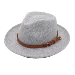 Detail view of a light gray fedora hat with brown decorative band and tassel knot