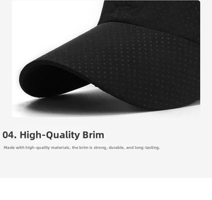 Macro detail of breathable mesh holes on black quick-dry baseball cap brim