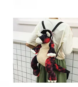 Rear view of a cute red and black dinosaur plush backpack with soft straps for kids