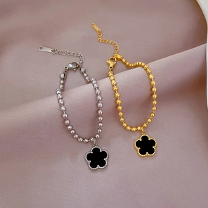 Titanium steel beaded clover charm bracelet in gold and silver finish for women
