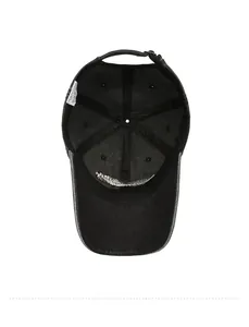 Interior view of black washed cotton baseball cap with adjustable metal buckle and labels