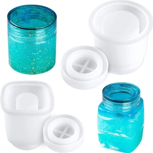 Detail of cylinder silicone molds for resin DIY storage jars with gold leaf finished product