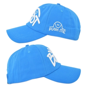 Detail of blue baseball cap showing white push ME embroidery and curved brim stitching