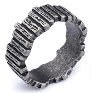 Macro view of retro silver ring showing rugged bark texture and oxidized vintage finish