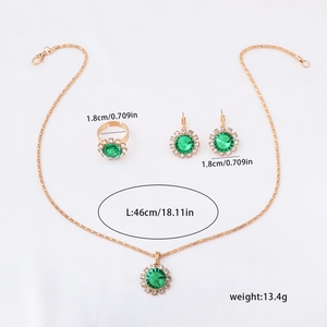 Detailed size specifications for gold jewelry set with green stones and clear diamonds