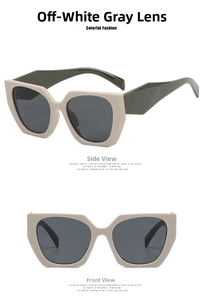 Detail view of geometric polygonal sunglasses in beige and olive green with grey lenses