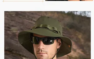 Detail of army green sun hat with wide brim and tactical loops for outdoor hiking