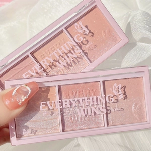 Close-up of 3-color pink blush palette with pearl finish and engraved logo lettering