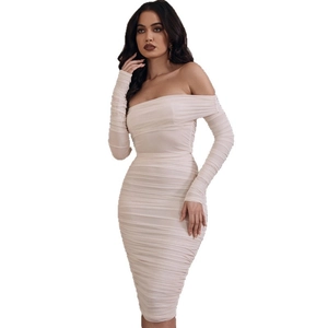Detail of off-shoulder midi dress with ruched mesh texture and long sleeves in apricot beige