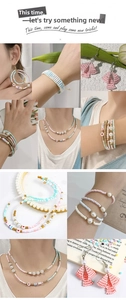 Mix of colorful glass seed beads and alphabet charms for DIY jewelry making sets