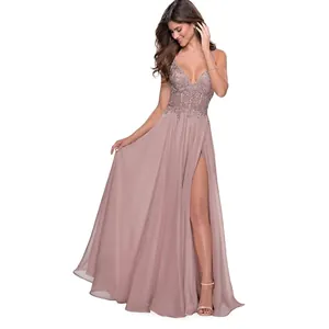 Detail of dusty rose lace bodice and deep V-neckline on a chiffon evening gown