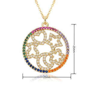 Close-up of golden necklace with 25mm rainbow gemstone openwork pendant with heart details