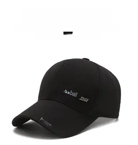 Close-up of black cotton baseball cap featuring embroidered letters and sport metal tag