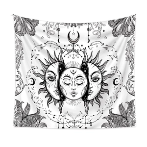 Close-up of bohemian sun and moon tapestry with celestial patterns and astrology symbols