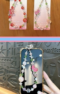 Detailed view of handmade crystal beaded phone strap with exquisite pink tulip charm