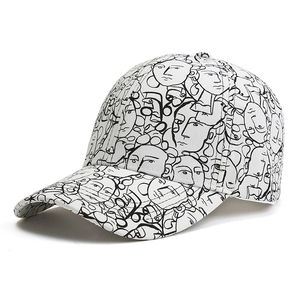 Adult baseball cap featuring white fabric with stylish black abstract face line art patterns