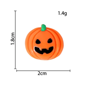Detailed view of resin Halloween pumpkin charm with 2cm x 1.8cm size measurements