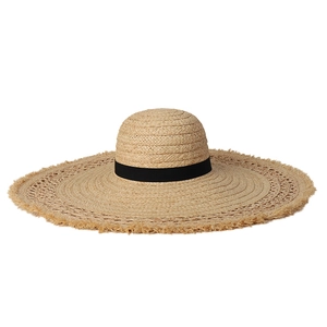 Handmade oversized raffia straw sun hat with fringe brim and black ribbon decoration
