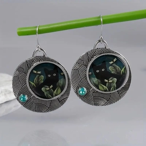 Vintage alloy cat drop earrings with retro illustration and green crystal accents