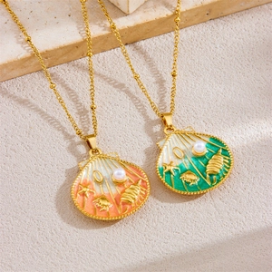 Colorful enamel shell necklaces with pearls and starfish on a natural stone background