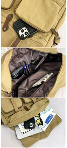Detail view of khaki canvas messenger bag with multi-pocket layout and large interior space