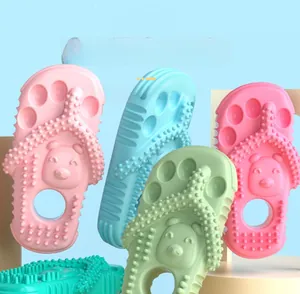 Detail view of colorful slipper-shaped rubber dog chew toys with teeth-cleaning textures