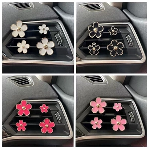 Daisy flower car air vent perfume clips in black, white, pink and rose red finishes