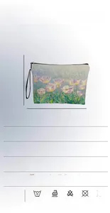 Floral makeup bag detail showing fine linen texture, 17x25cm dimensions and zipper