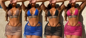 Macro view of three-piece crochet bikini set with matching mesh skirt in multiple colors