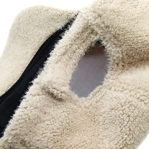 Detailed macro view showing the plush faux mink fur texture and quilted inner lining