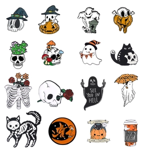 17-piece Halloween enamel pin set with skull, pumpkin and ghost designs in a matrix layout