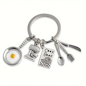 Cooking keychain set with frying pan, mixer, cookbook and utensils in silver metal