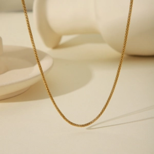 18k gold plated stainless steel mesh chain necklace in a minimalist luxury setting