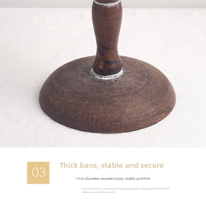 Detailed view of the 11cm vintage dark solid wood circular base for jewelry display