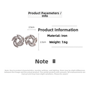 Detail view of silver abstract geometric hollow earrings showing 2.5cm dimensions and size