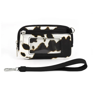 Detail of cow print card holder featuring transparent window and black wrist strap