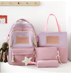 Pink and purple four-piece school bag set with backpack, tote, pouch and pencil case