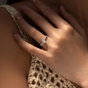 Elegant S925 sterling silver ring with marquise cut moissanite and pave diamonds