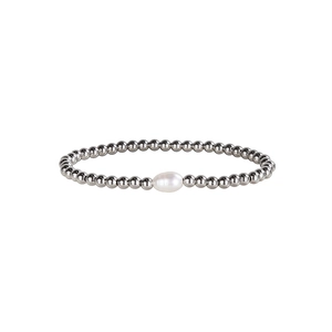 Close-up of silver beaded bracelet with a white freshwater pearl centerpiece