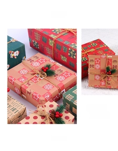 Detail of vintage Christmas kraft wrapping paper with Santa patterns and jute rope