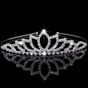 Elegant silver metal tiara with sparkling rhinestones for bridal or children performance