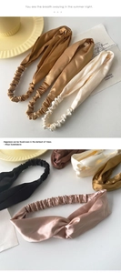 Detail of silk satin twisted headbands in vintage champagne, bronze, and pink shades