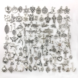 Mixed set of vintage silver alloy charms for DIY jewelry making with multiple designs