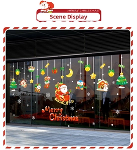 Detailed view of Christmas static window stickers featuring Santa, reindeer and trees