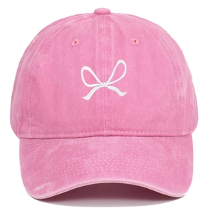 Pink washed cotton baseball cap with white bow embroidery in a vintage casual sport style