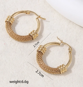 Detailed view of golden mesh textured hoop earrings with a 2.7cm diameter and 6.6g weight