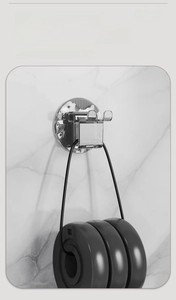 Close-up of dual-hook wall mount with strong adhesive backing for heavy-duty hanging